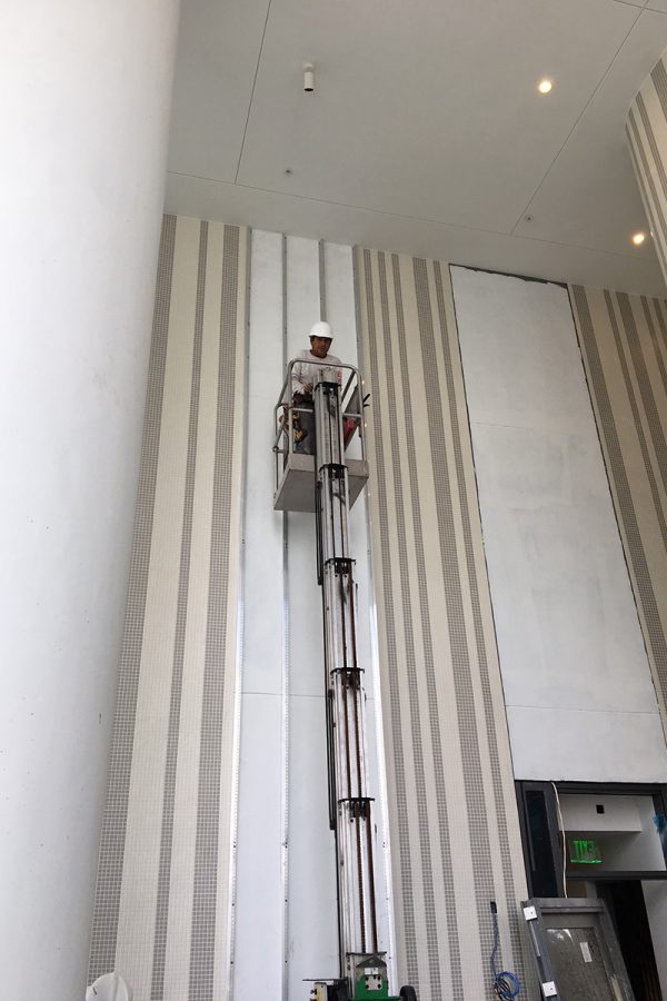 Installation of furring strips for the green walls at SLS LUX Miami.