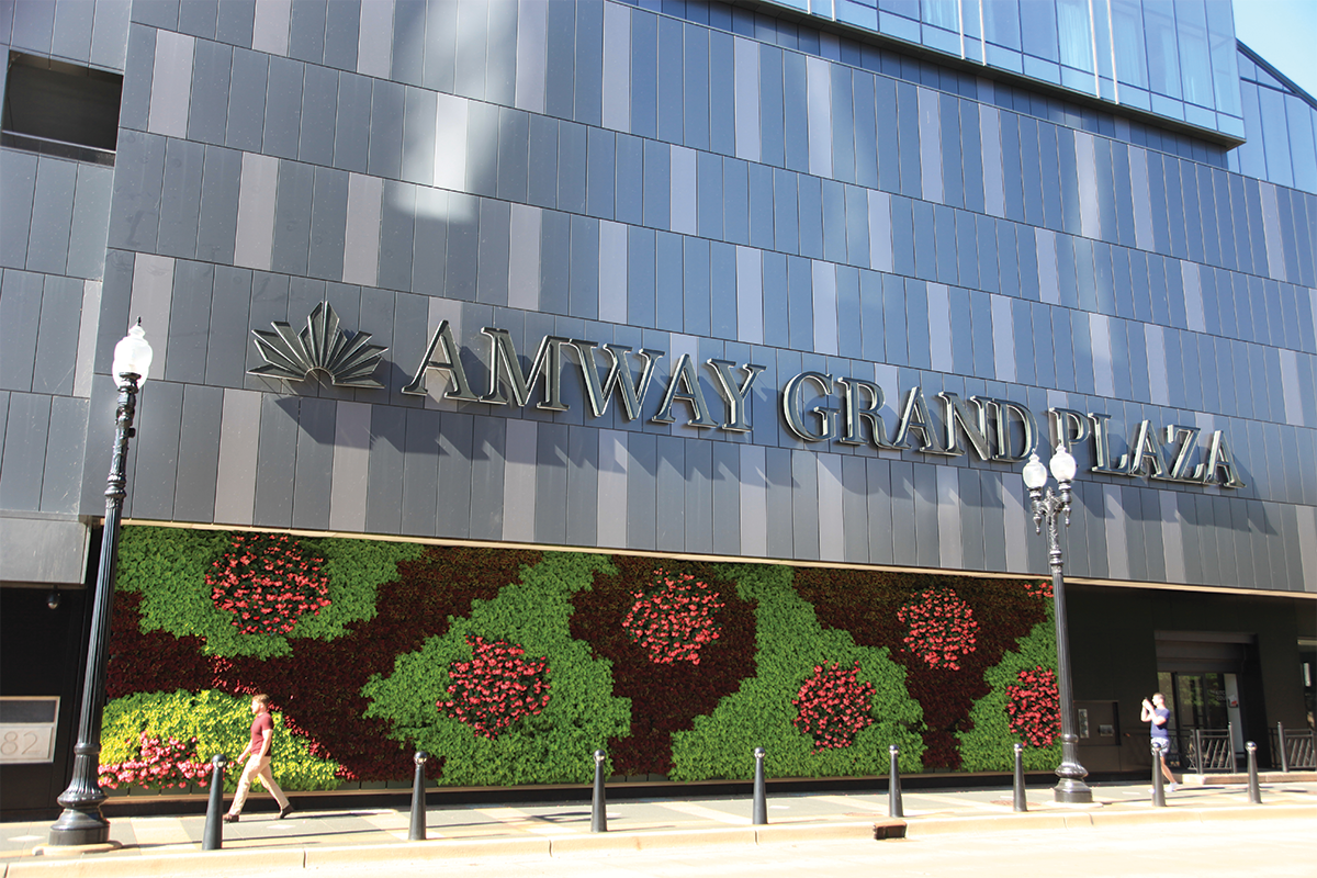 Side of the Amway Grand Plaza Hotel building, showing off its colorful living wall